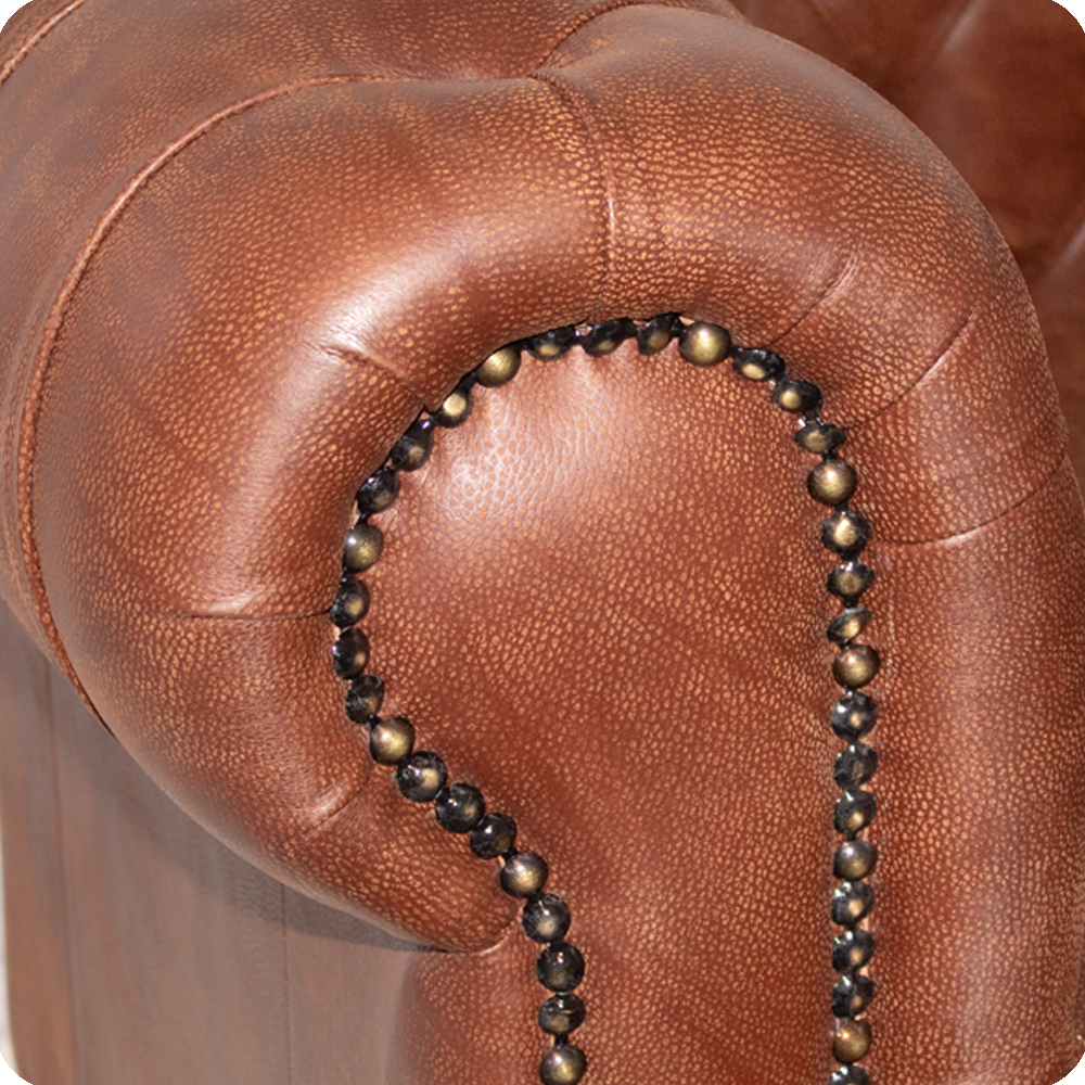 Chesterfield 2 seater leather arm close up