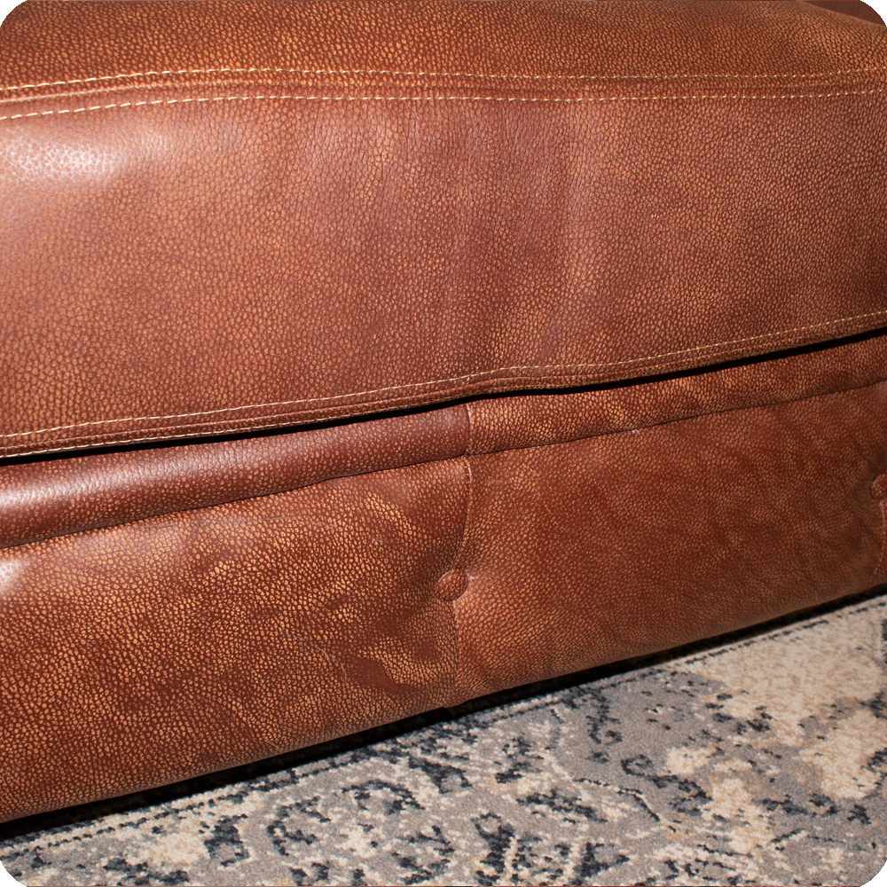 Chesterfield 2 seater leather bottom panel close up