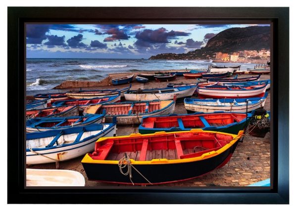 dark framed print of boats