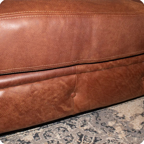 Chesterfield 2 seater leather bottom panel close up