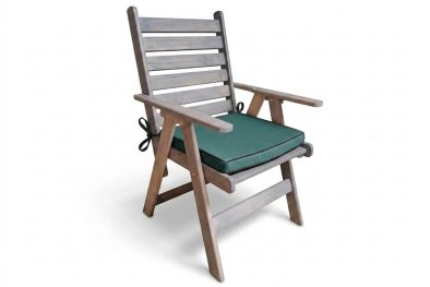 Aged pine patio chair with green seat cushion